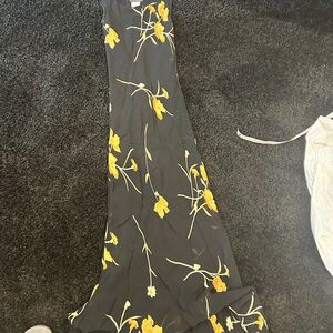 Chic Black Maxi Dress with Yellow Floral Design